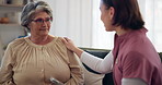 Senior woman, nurse and comfort in home on sofa, tablet or discussion with survey for wellness in retirement. Elderly person, caregiver and smile with digital touchscreen, app and explain in lounge
