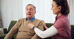 Woman, nurse and senior man with breathe for healthcare, checkup and exam in nursing home. Doctor person, stethoscope and listen for medical support, lung disease and mature patient with caregiver