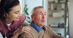 Woman, caregiver and person with disability, talking and senior care for patient, pointing and wheelchair. Healthcare, medical professional and rehabilitation in clinic with nurse and assisted living
