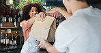 Cafe, smile and woman with package, delivery and waiter with tablet for online order and customer service. Coffee shop, barista and people with takeaway for ecommerce, happy and tech for distribution