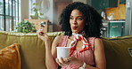 Black woman, ice cream and snack on sofa with smile for satisfaction, eating and craving in house. African girl, gelato and happy in home living room on couch for frozen dessert or yogurt and sweets