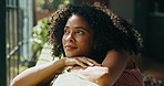Happy, thinking and woman by window with ideas, inspiration and daydreaming on sofa. Home, morning and African person relax in living room with daydreaming, planning day and reflection on weekend