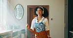 Headphones, audio and woman dance in home, streaming sound or playlist subscription on weekend. Living room, music and African person moving to favorite song, happy or listening to radio with energy