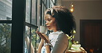 Coffee, thinking and woman by window in home with ideas, inspiration and daydreaming. Happy, morning and African person in living room with drink for daydreaming, wellness and satisfaction on weekend