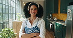 African woman, face and arms crossed in home, morning and kitchen with pride, confidence and afro. Person, happy and trendy with style, smile and start day by window in portrait at apartment in Kenya