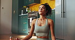Girl, yoga and lotus on floor, home and breathing with meditation, wellness and peace in kitchen. Woman, mindfulness and exercise mat for mental health, chakra and balance in morning at apartment