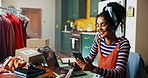 Woman, fashion designer and phone in studio with smile, contact and excited for deal for shipping at small business. Person, laptop and app for networking with supplier, order or fabric in workshop