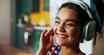 Home, headphones and happy woman listening to music, radio and sound on internet in kitchen. Audio, technology and female person dance to favorite song, kpop and streaming album on weekend to relax