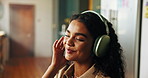 Home, smile and woman with headphones, listening to music and happiness in lounge. Apartment, energy and person with headset, audio and sound with break, relaxing and radio with positive mindset