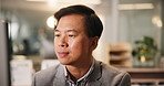 Reading, online and Asian man with computer, office and sales manager with notes for project and corporate. Review, employee and person with tech for financial report, typing and planning in business