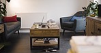 Empty apartment living room with home decor and furniture for lifestyle living. Arranged house interior, real estate or property design with object detail. Layout, comfy home space with nobody