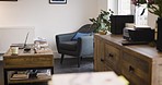 Furniture, living room and interior of a modern house or apartment in a stylish open space. Luxury sofa, wood coffee table and tropical plants for home decor or accessories in lounge at an empty home