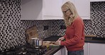 Woman, cooking and cutting vegetables in kitchen, preparing dinner or delicious meal in home. Food, health and female chef from Canada chop veggies, cook gourmet dish or healthy salad in house alone.