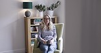 Coffee, tea and relax woman drink cup of espresso for mindset wellness, peace and enjoy calm day in home living room chair. Drinking hot beverage, stress relief and morning person thinking about life