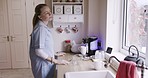 Woman, nurse and tea or coffee in kitchen of retirement home, house or medical clinic in work lunch break. Healthcare worker, employee or caregiver making drink in the morning