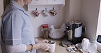 Woman, medical nurse or tea cup in kitchen of nursing home, house or rehabilitation clinic in work lunch break. Healthcare worker, employee or insurance caregiver making hot drink in volunteer center