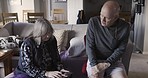 Phone, support and senior man with a caregiver for communication, healthcare and consultation in a nursing home. Healthcare, web and woman with a mobile consulting with a patient in rehabilitation