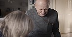Help, senior rehab and elderly man getting helped by caring wife in his retirement home. Mature couple in nursing home with help for struggling, frail old man. Relationship, retire people with care 