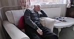 Tired old man sleeping on sofa, living room and relax, dreaming and afternoon nap time in peace, quiet and calm for break at home. Senior, sleepy and elderly pensioner, retirement and rest in lounge