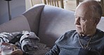 Retirement, senior man and milk drink for strong bones and healthy body in a nursing home. Assisted living, mature male and calcium or dairy drinking for a health diet and nutrition on the couch 