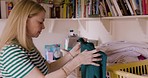 Woman folding clothes, laundry and clean, hygiene and washing basket on a table in the room of her house. Cleaner, worker or packing, cleaning and organizing clothing and fabric on a desk in home