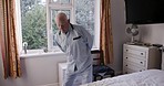 Old man, rehabilitation and hip movement, body mobility and exercise in bedroom for healthy lifestyle, fitness and physiotherapy. Senior elderly guy, morning stretching and muscle movement in home 