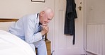 Depression, sad and senior man in bed sitting on edge with worry, loneliness and upset in morning. Retirement, insomnia and frustrated elderly male in bedroom suffering from grief, loss and anxiety