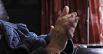 Beauty, hand cream and senior person apply lotion or cream to hands for moisture while relaxing at home. Retirement, age and closeup on hands of elderly man applying bodycare product for soft skin
