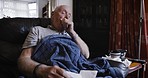 Sick, covid healthcare and senior man cough in a rehabilitation nursing retirement home. Sickness, tissue and virus of a elderly person with flu illness, covid 19 or dengue fever in a living room