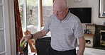 Cleaning, vacuum and senior man in home vacuuming floor for hygiene. House chores, spring cleaning and retired elderly male from Australia in living room with vacuum cleaner to remove dust and dirt.