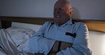 Senior man, bed and stomach pain with cramps, ibs or gastritis while suffering from injury. Retired male, ill or sick in his bedroom with abdominal ache and hurt due to appendicitis and bad health