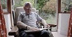Relax, reading and senior man with glasses sitting on sofa and enjoying freedom, retirement and free time. Nursing home, happiness and elderly male putting on eyewear to read book in living room