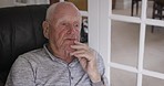 Thinking, sad and senior man on sofa for Alzheimer, rehabilitation and depression in nursing home. Retirement, healthcare and mental health with elderly patient with dementia, confused or memory loss