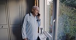 Home, phone call and senior man talking, speaking or chatting. Contact, retirement and happy elderly male from Australia by window on mobile smartphone networking, conversation or having discussion