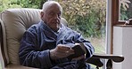 Senior man, phone call and talking in home, chatting or speaking. Retirement, contact and elderly male from Canada in discussion recording voice note, networking or conversation on mobile smartphone.