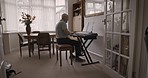 Senior man, piano and playing notes for training, enjoy retirement and happy in home. Retired, mature male or pianist practice, happiness or have fun for studying music, relax or hobby in living room