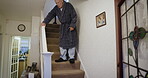 Senior man, walking or staircase in house or nursing home in surgery recovery healthcare, life insurance or medical support. Retirement elderly person, climbing steps or hand rail rehabilitation help