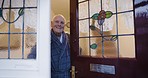 Old man open front door of house to welcome guests, people and visitors to home, apartment or residence. Happy senior portrait opening doorway entrance of retirement property with smile or happiness