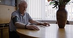 Blood pressure, test and senior man at hospital, healthcare help and monitor of health during retirement. Medicine, medical machine and elderly person at a clinic for hypertension and consultation