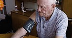 Elderly man, healthcare and blood pressure check, nursing home and cardiovascular with heart health. Old, medical equipment and machine for health care, aging and cardio, hypertension and senior care