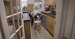 Senior man, washing machine and laundry in house or home housekeeping, hygiene maintenance or household cleaning. Dryer, clothing appliance and cleaner equipment, clothes basket or retirement elderly