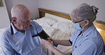 Old man with caregiver, health and blood pressure check with machine, retirement and nursing home. Medical care, wellness and aging with cardiovascular healthcare, woman in face mask and nurse