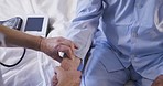 Elderly man, night and bed for blood pressure in nursing home for health, wellness or hypertension. Senior, retirement and nurse with medical tech in bedroom for help, consultation or check in clinic