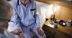 Senior man, rehab and medical healthcare giver checking pulse, blood pressure or sugar. Elderly male in checkup, visit or diabetic at home with woman nurse monitoring health and wellness in bedroom