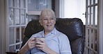 Old couple, retirement and relax with conversation together, coffee break at house or nursing home. People, care and love in marriage with communication, health and wellness with retired lifestyle