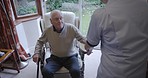Nursing home, living room and caregiver with senior man for healthcare, disability assistance and medical support. Rehabilitation, retirement and nurse help sick, disabled and elderly patient in sofa