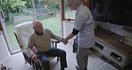 Nursing home, nurse and senior man in living room for healthcare, rehabilitation and medical support. Disability assistance, retirement and caregiver helping elderly patient from relaxing on couch