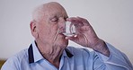 Healthcare, senior and man with water for medicine, pills and pain during retirement. Health, sick and elderly man drinking pills with a drink for medical condition, hypertension and disease
