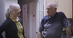 Love, relax  and senior couple talking in a kitchen, happy and smile while bonding in their home. Elderly, woman and man speaking, laughing and enjoying retirement, morning and relationship indoors