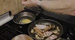 Old man hands, pan and cooking breakfast on stove for morning start, nutrition and wellness in home. Kitchen, eggs and meat for independent senior with food, health and ready for eating in house
